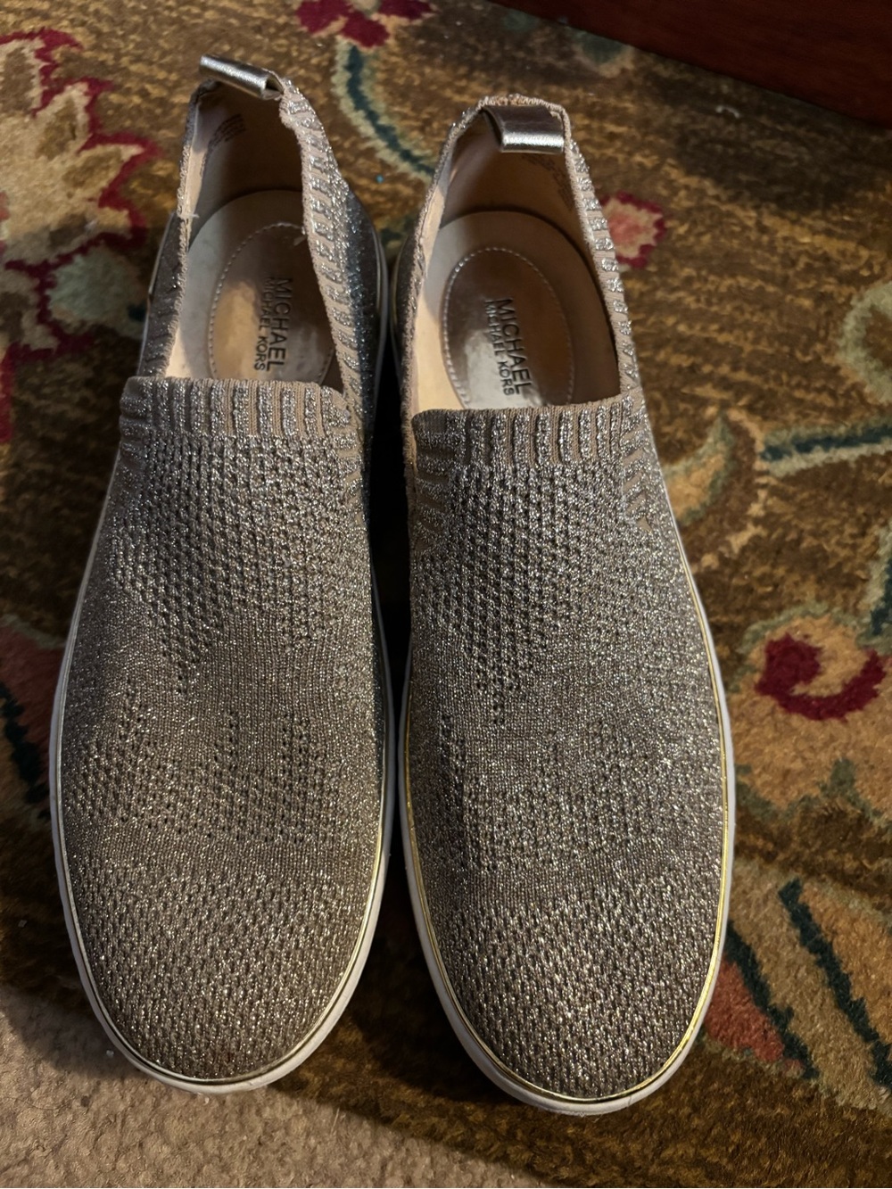 Michael Kors Women’s Slip-On Knit Sneakers in Metallic Gold.